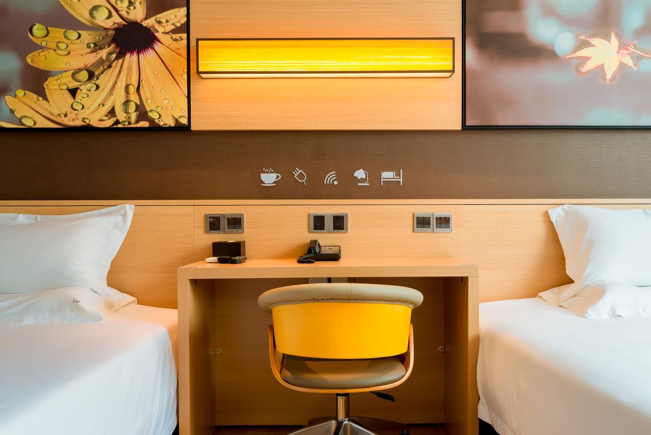 Iu Hotel Zhanjiang Haibin Avenue Xinhaimingchen المظهر الخارجي الصورة
